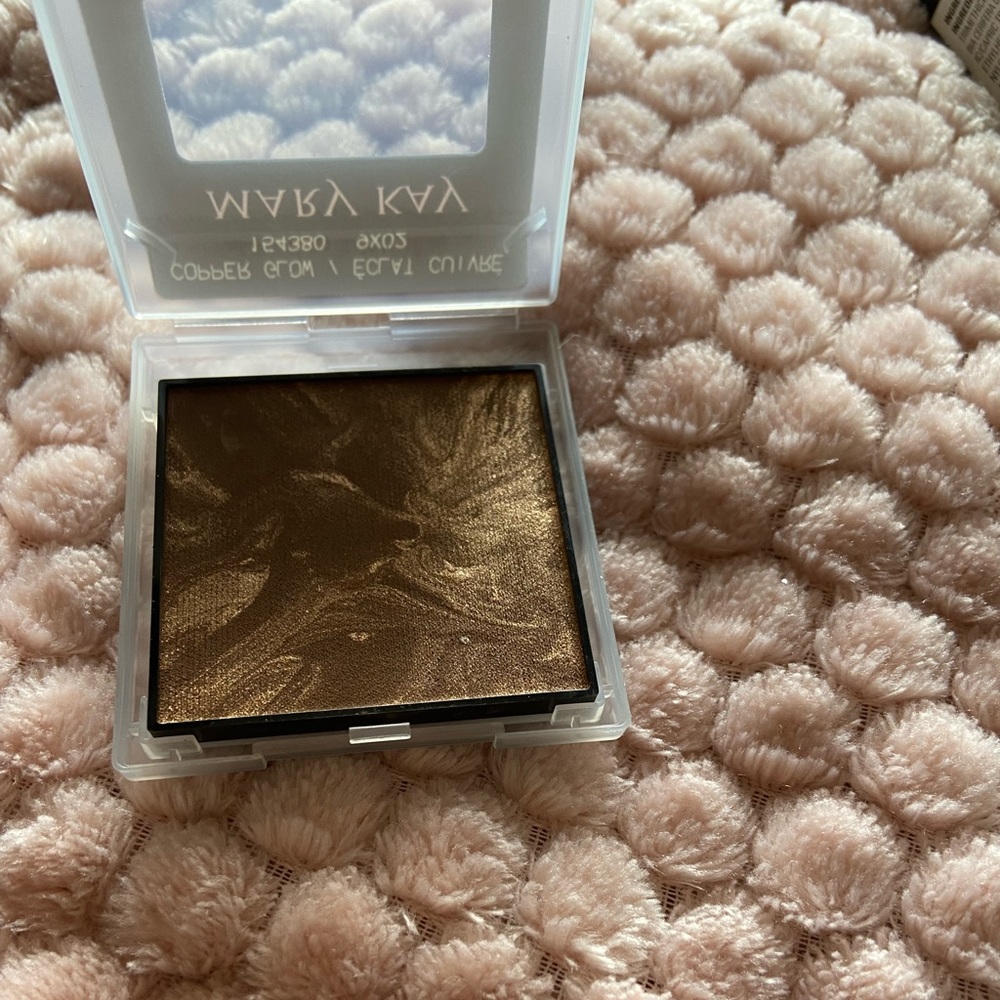 Mk/ bronzer